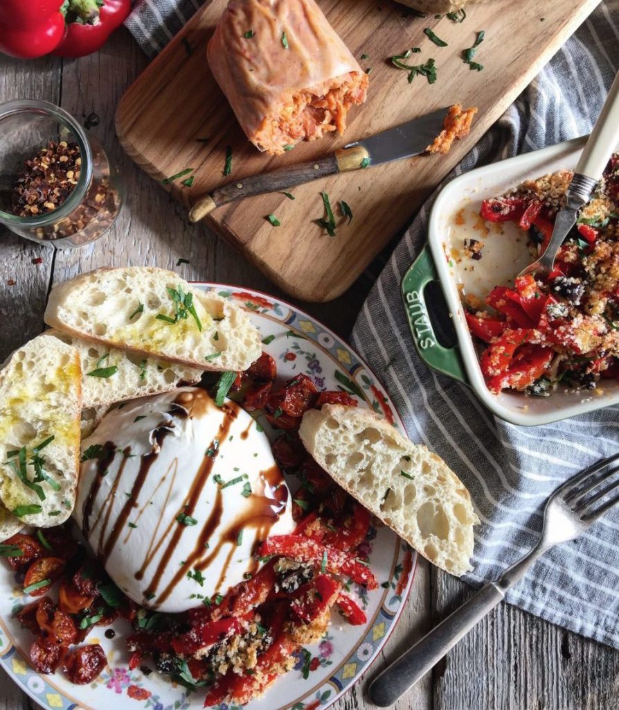 Roasted Red Pepper Gratin is served up with burrata, sausage and crostini.