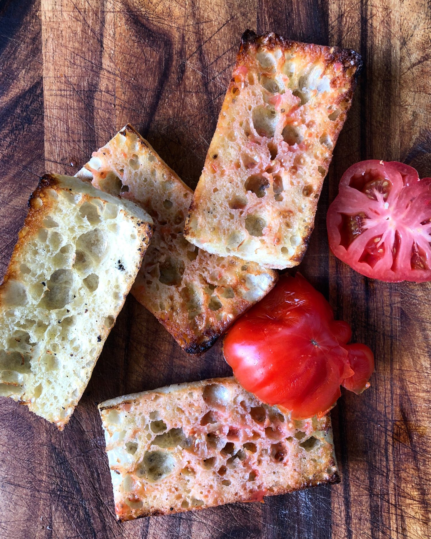 Grilled Ciabatta with olive oil, and rubbed tomato, pan con tomate