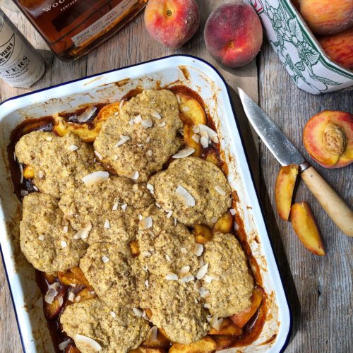 Spicy Maple Bourbon Peach Cobbler with a Cornmeal Biscuit topping