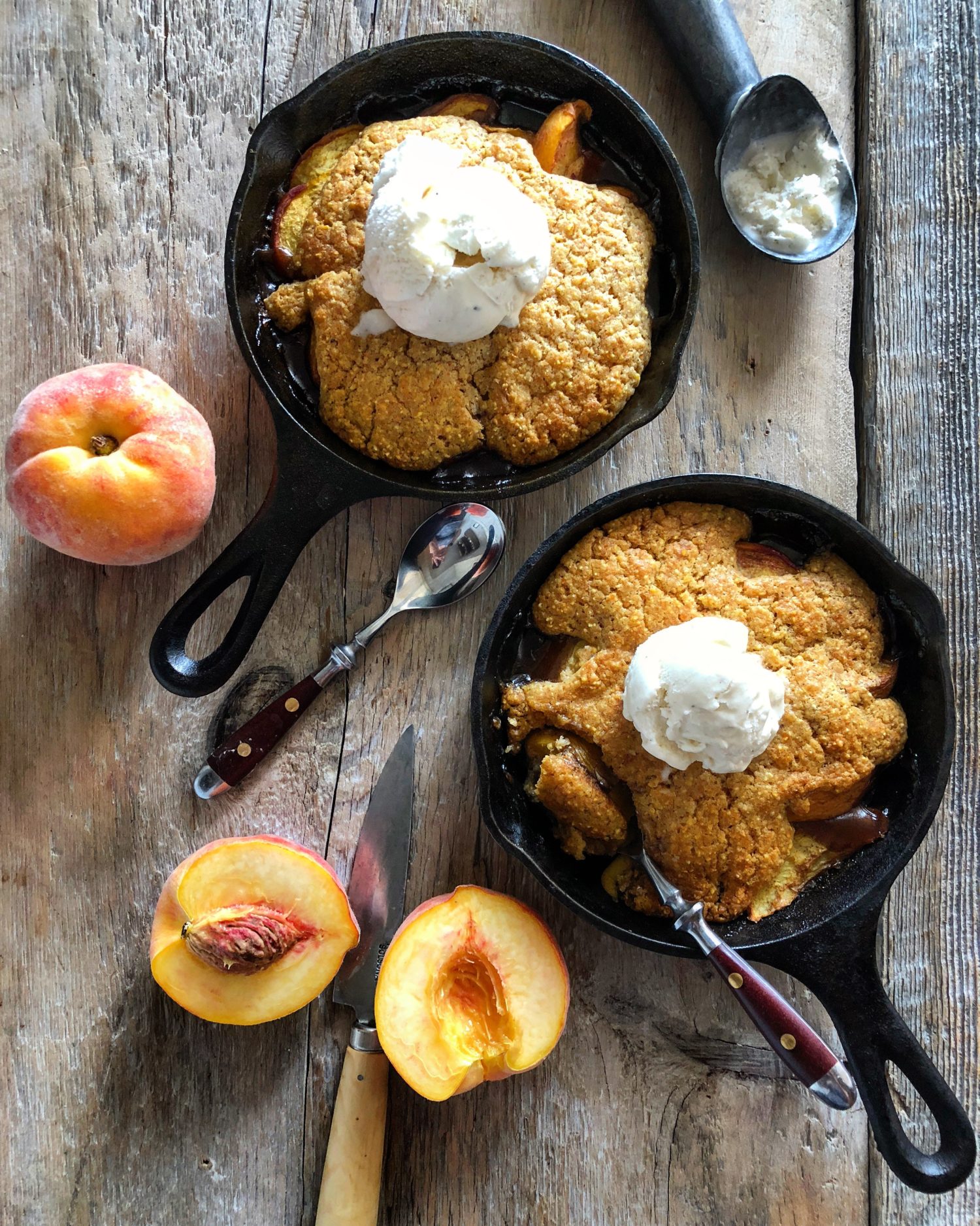 Spicy Maple Bourbon Peach Cobbler with Cornmeal biscuit Topping