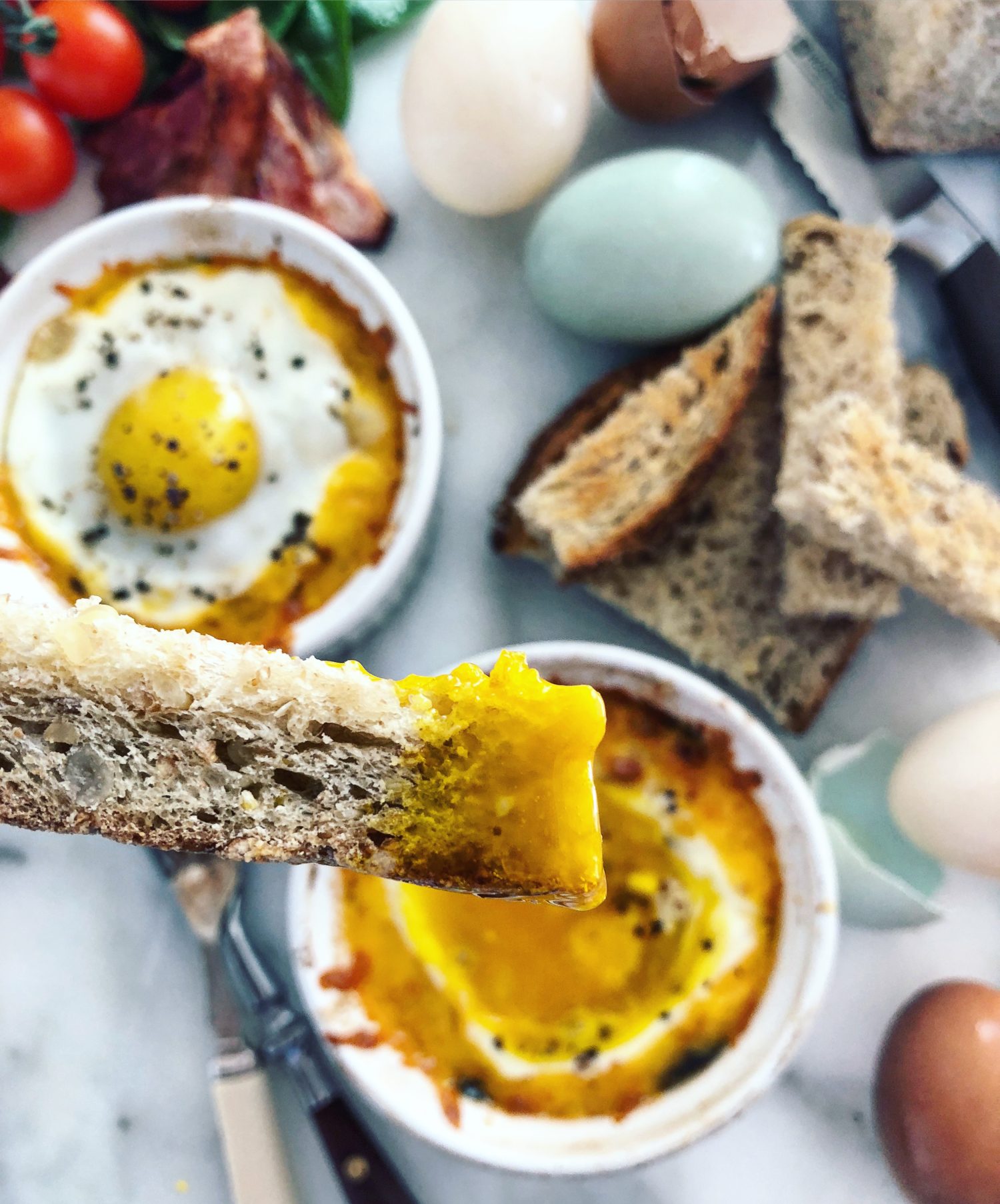 BLT Baked Eggs with drippy toast soldier