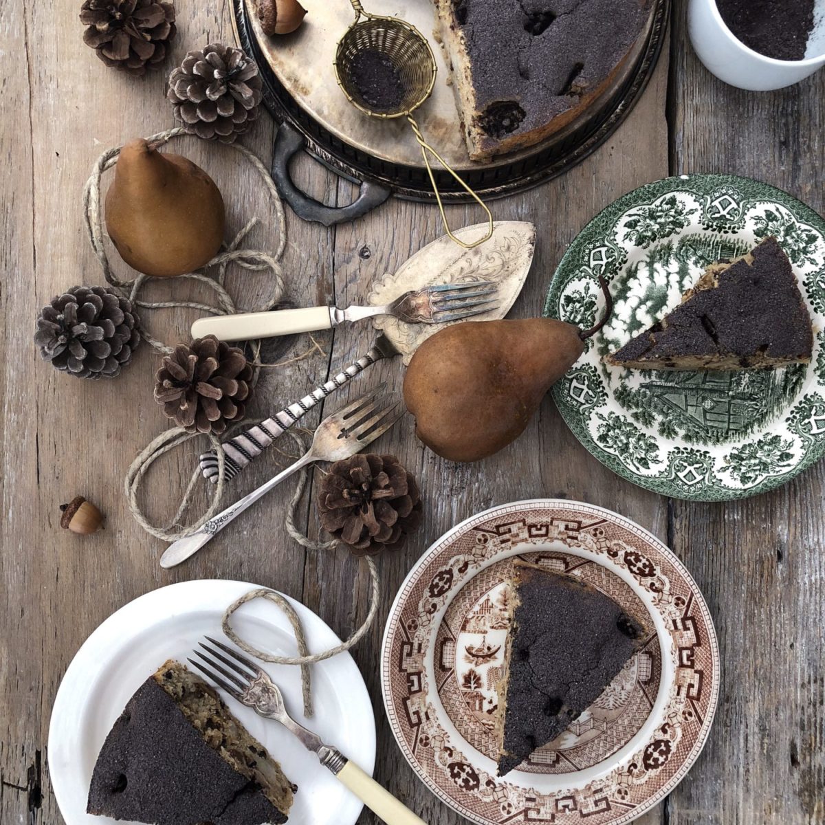 Tender Pear and Chestnut cake dusted with cocoa powder