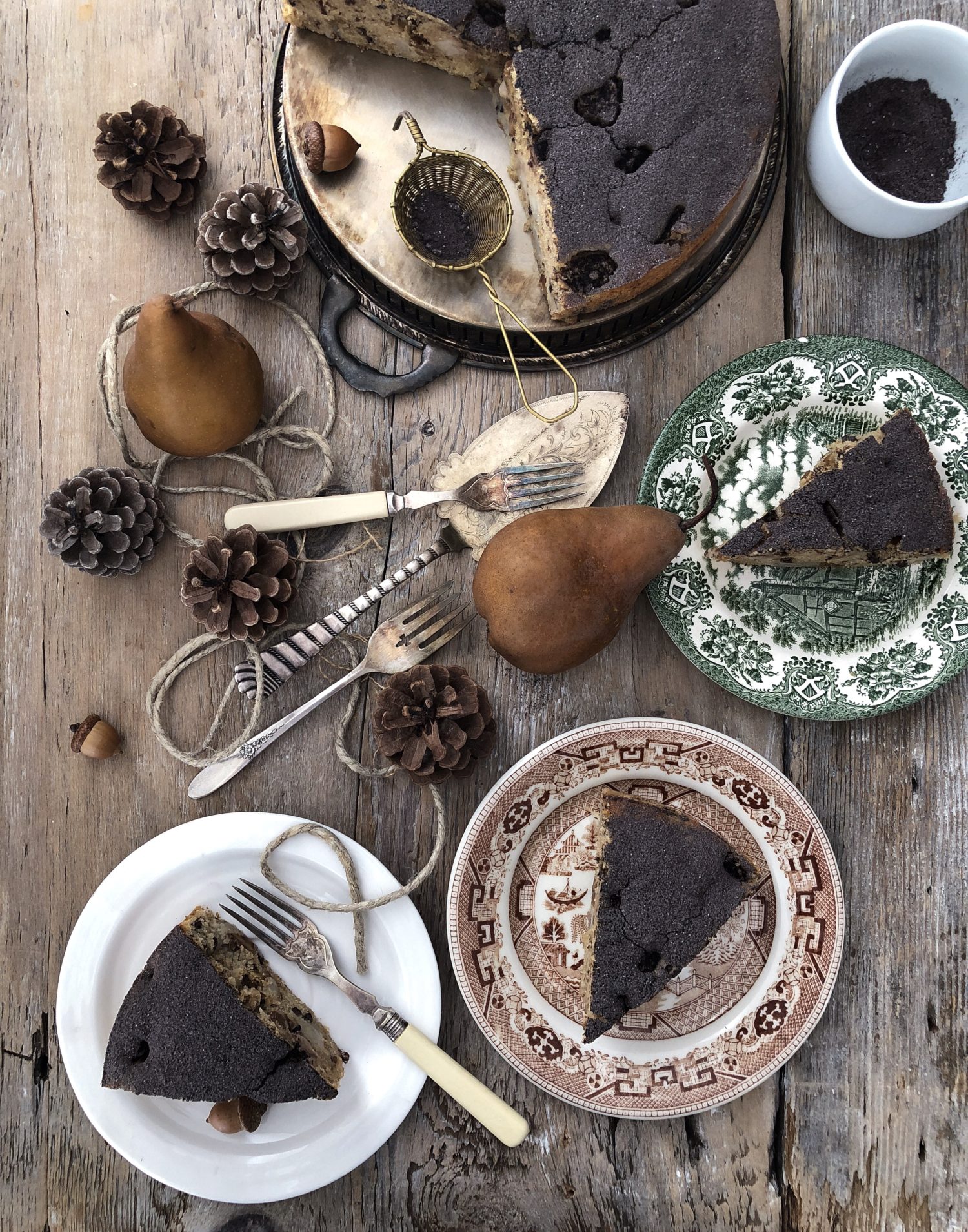 Tender Pear and Chestnut cake dusted with cocoa powder