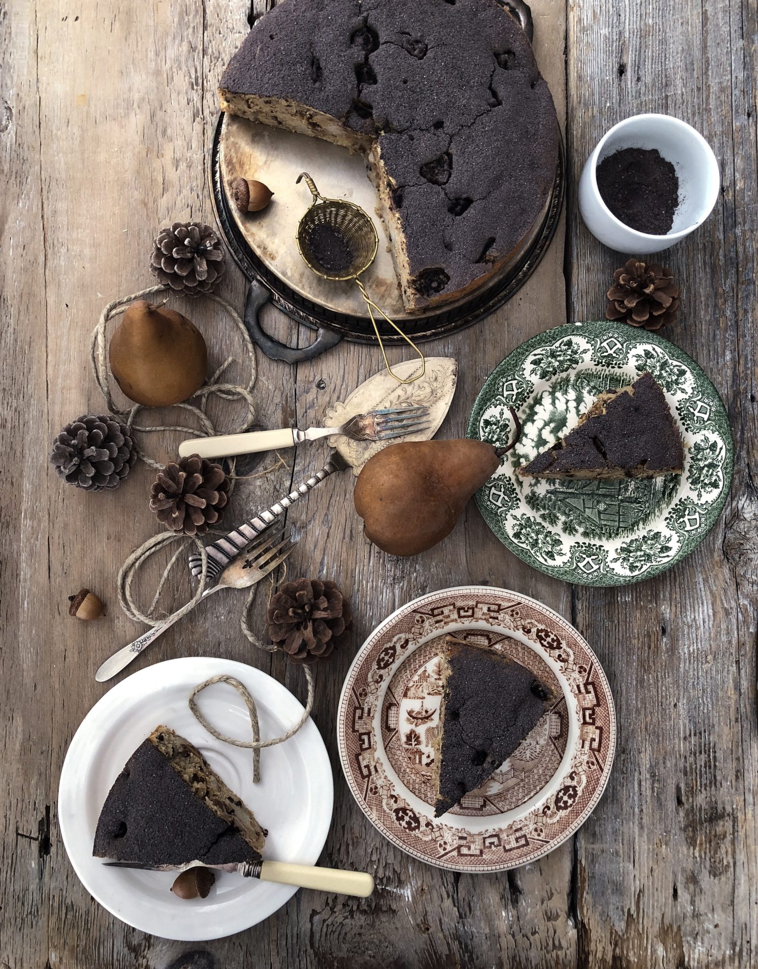 tender Pear and Chestnut cake dusted with cocoa powder