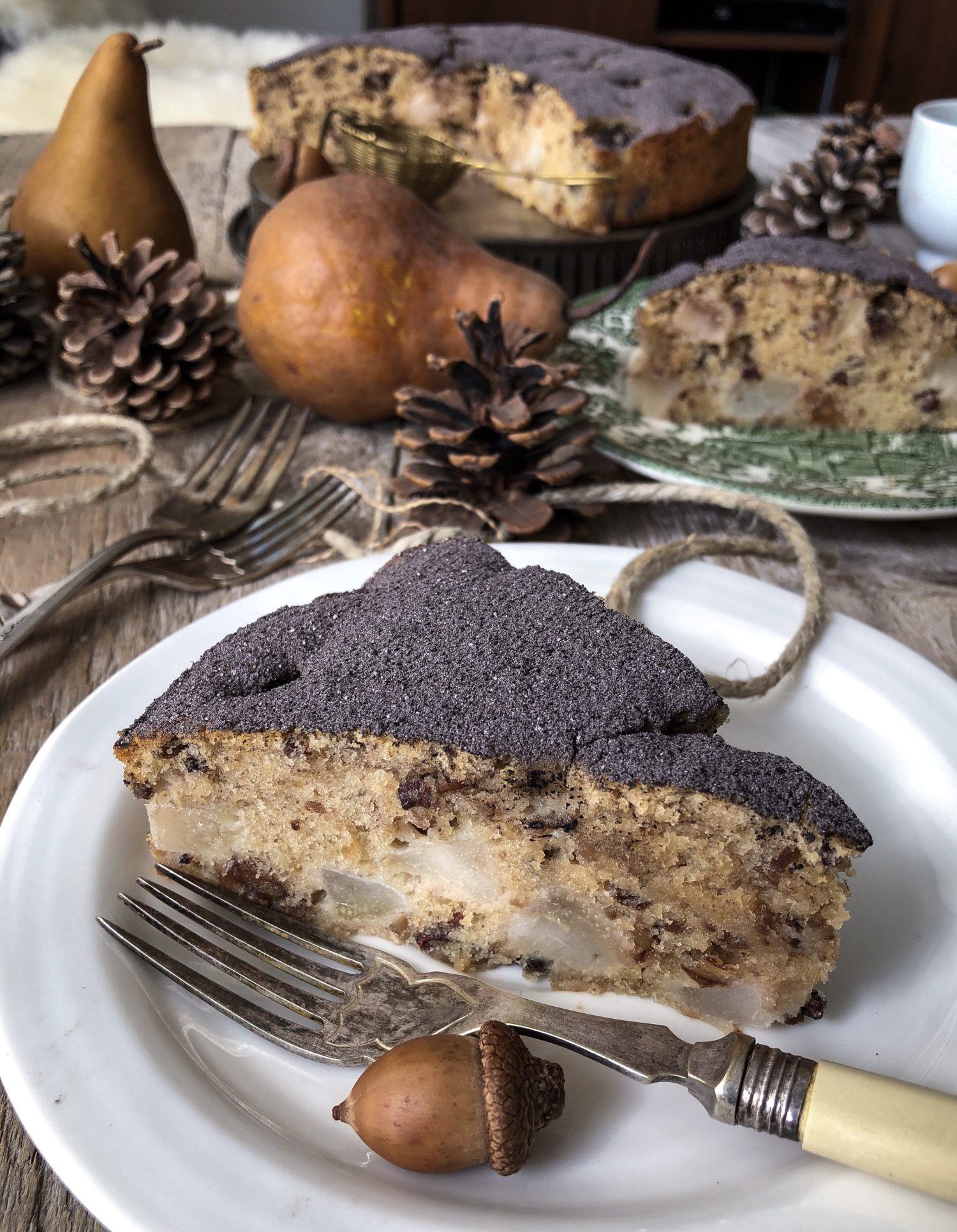 tender Pear and Chestnut cake dusted with cocoa powder