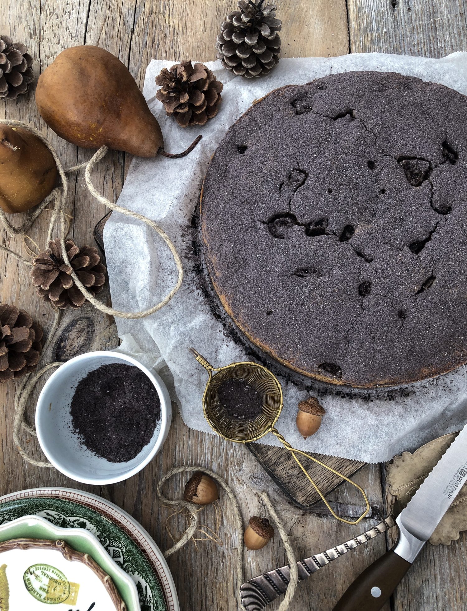 tender Pear and Chestnut cake dusted with cocoa powder