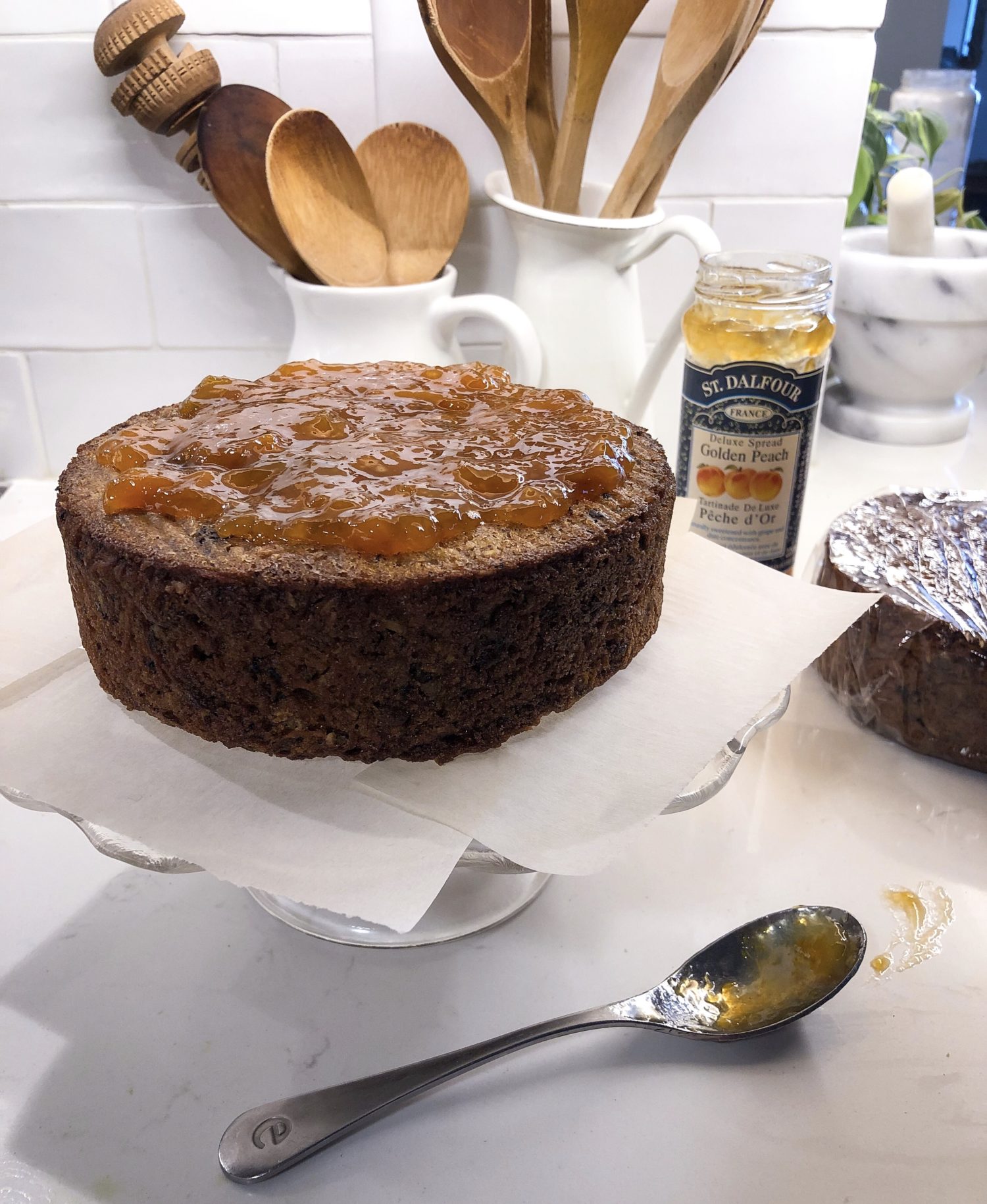 Cardamom Carrot Cake with Allspice Cream cheese Icing, peach preserves layer in between