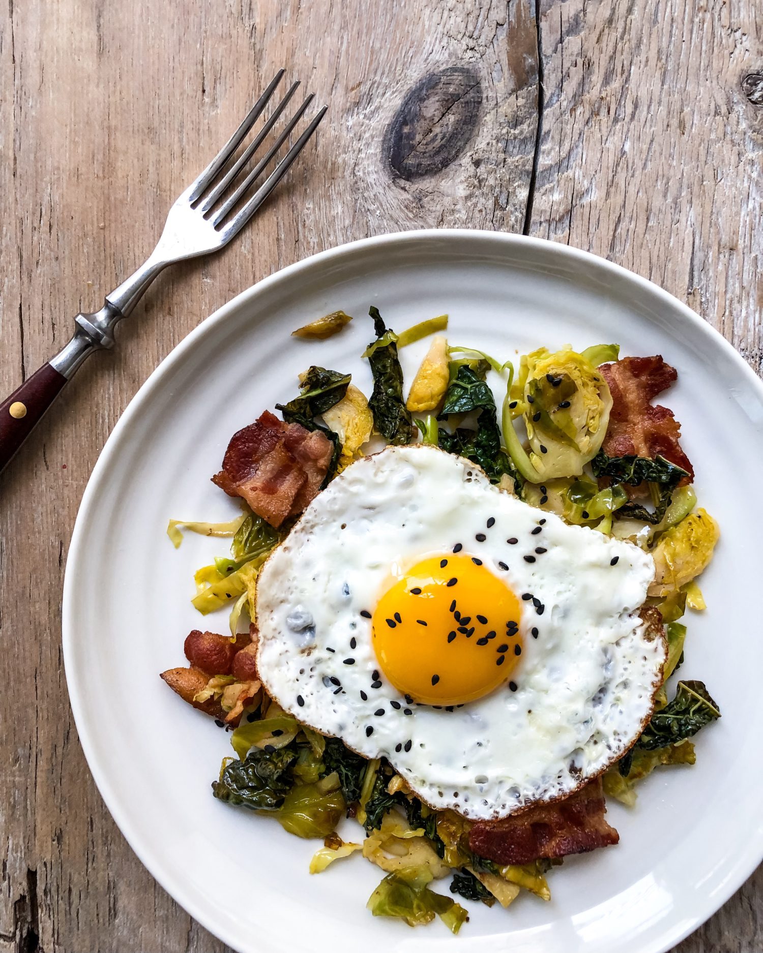 Deconstructed Kale and Brussels Sprouts Salad and sunnyside up egg