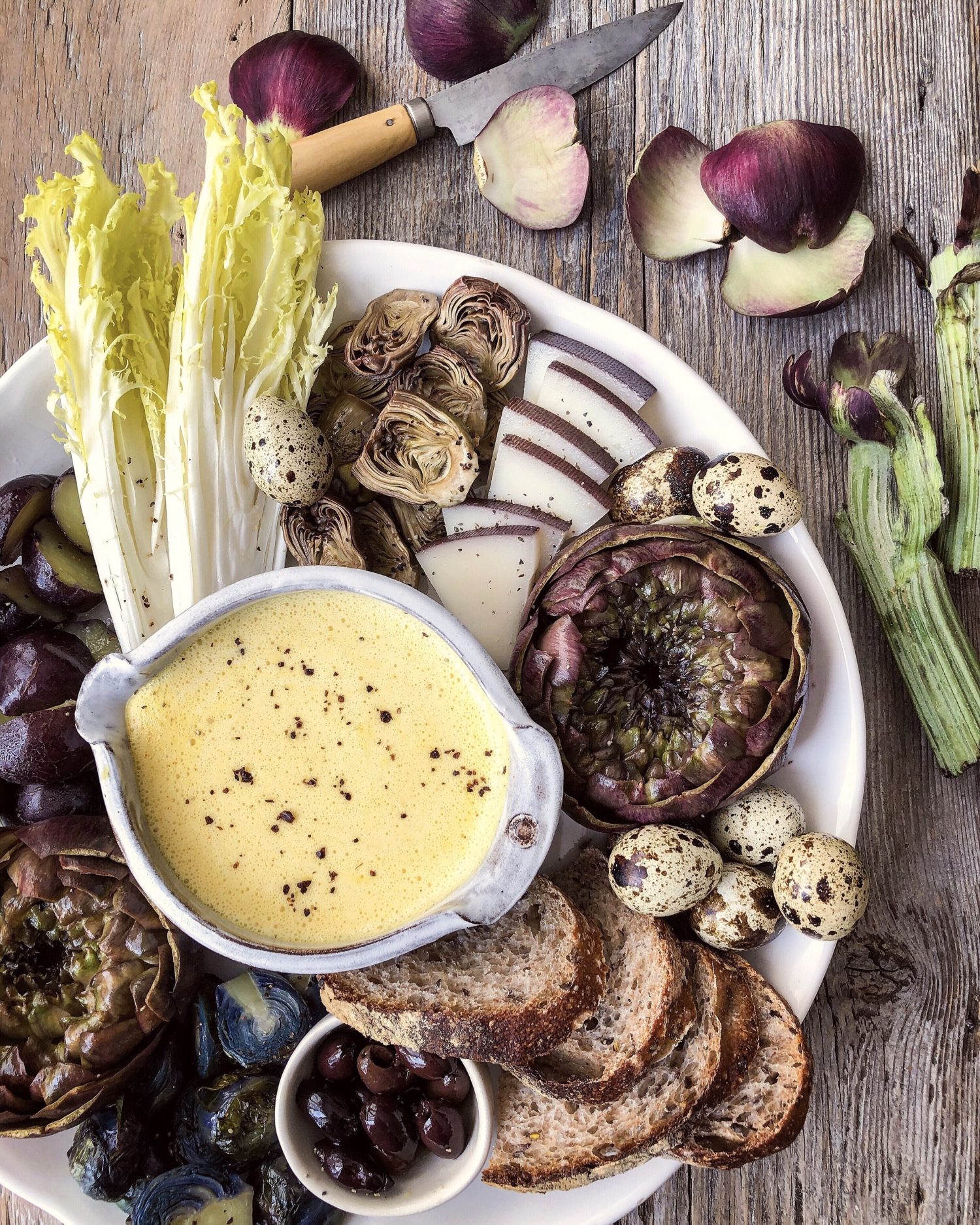 Purple Artichokes with Hollandaise, quail eggs