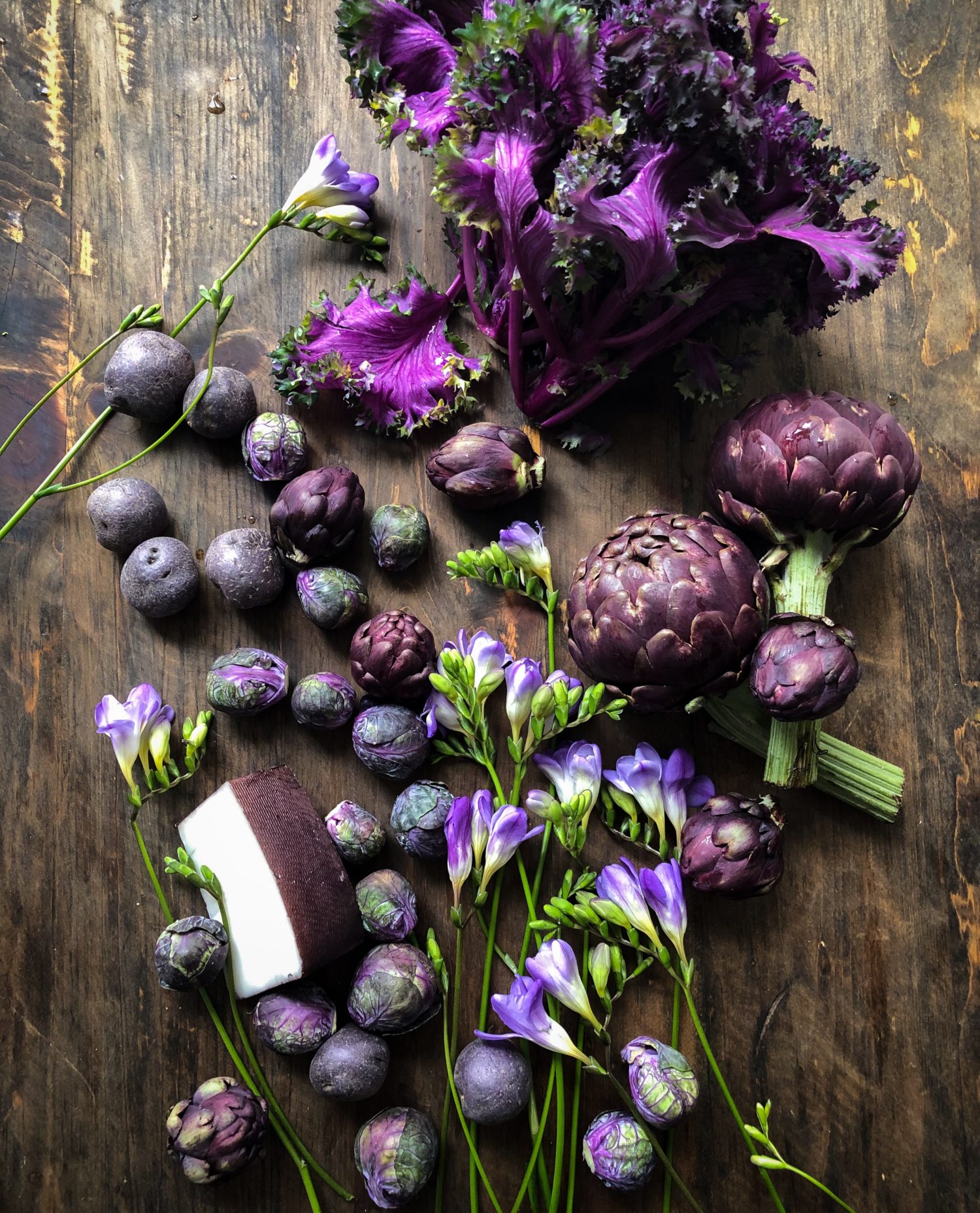 Purple brussels sprouts, artichokes, potatoes, flowering kale, goat cheese