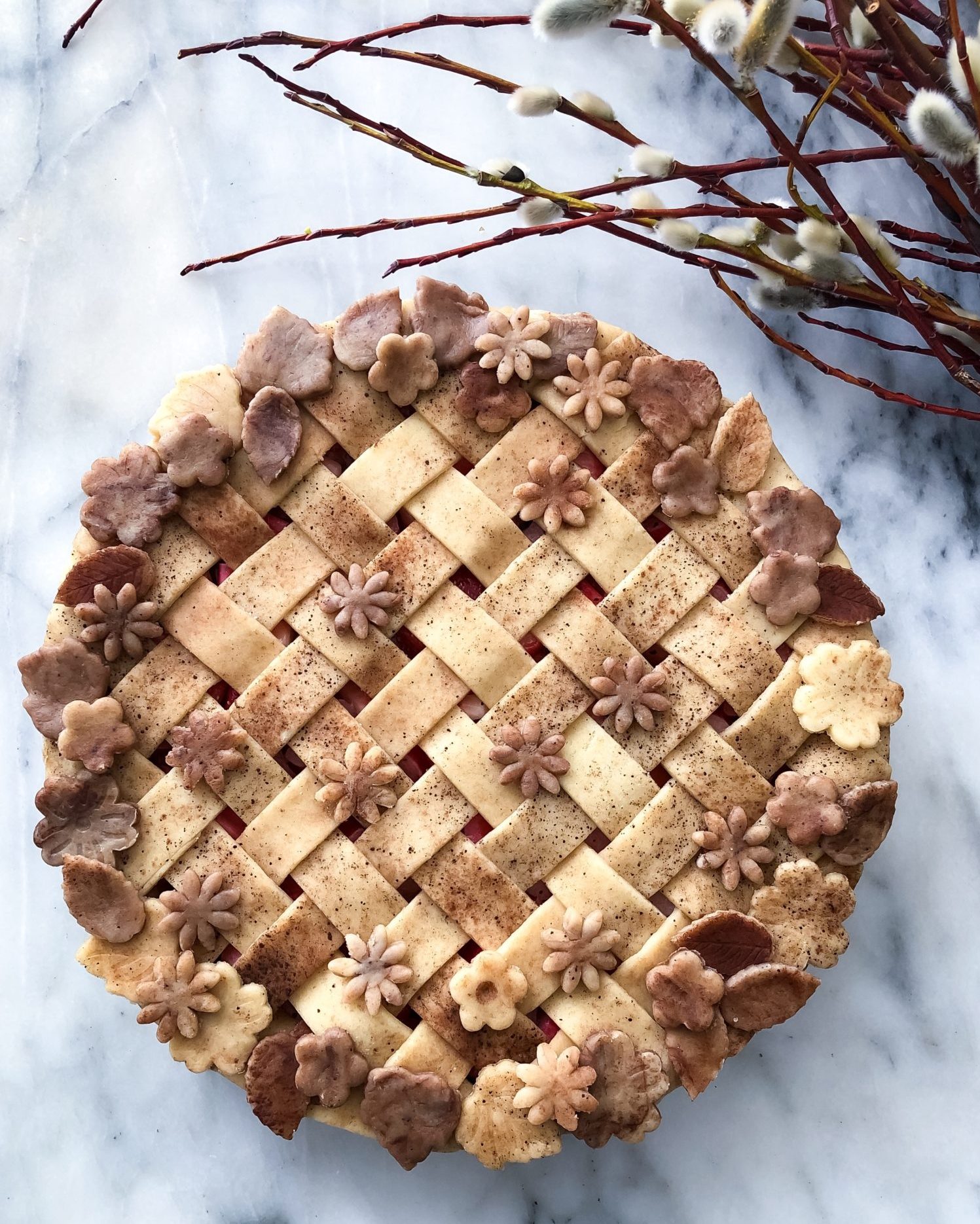 Strawberry Rhubarb Pie with Urfa Biber in a Chocolate Coffee Marble Crust, lattice, flower and leaf cut outs