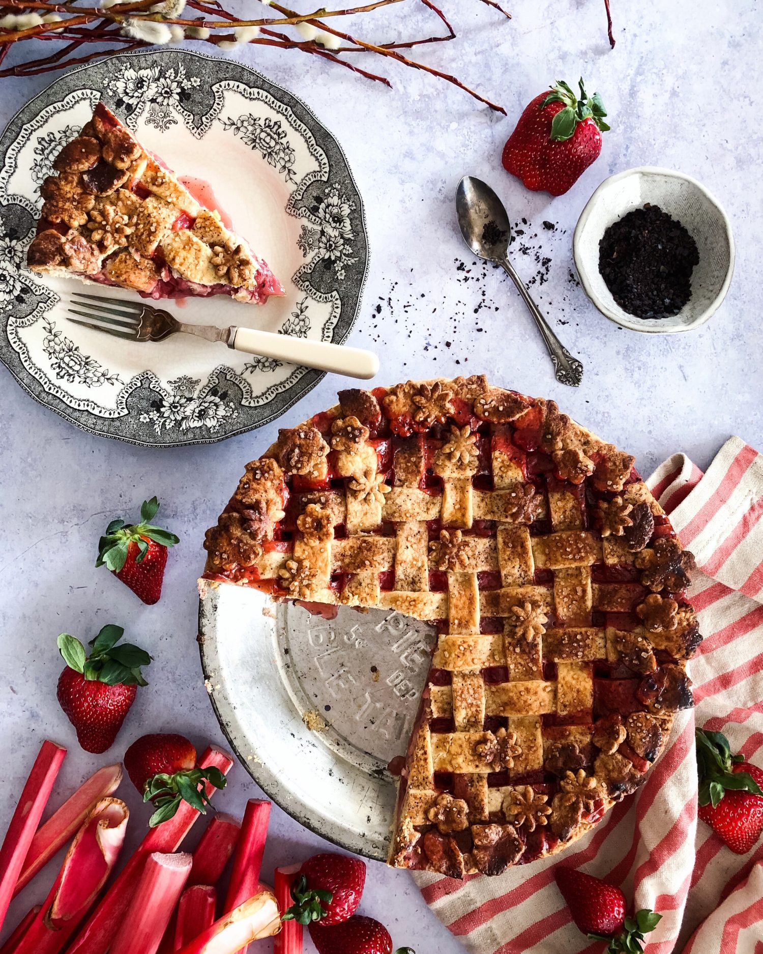 Strawberry Rhubarb Pie with urfa biber in a chocolate coffee marble crust, lattice, flower and leaf cut outs