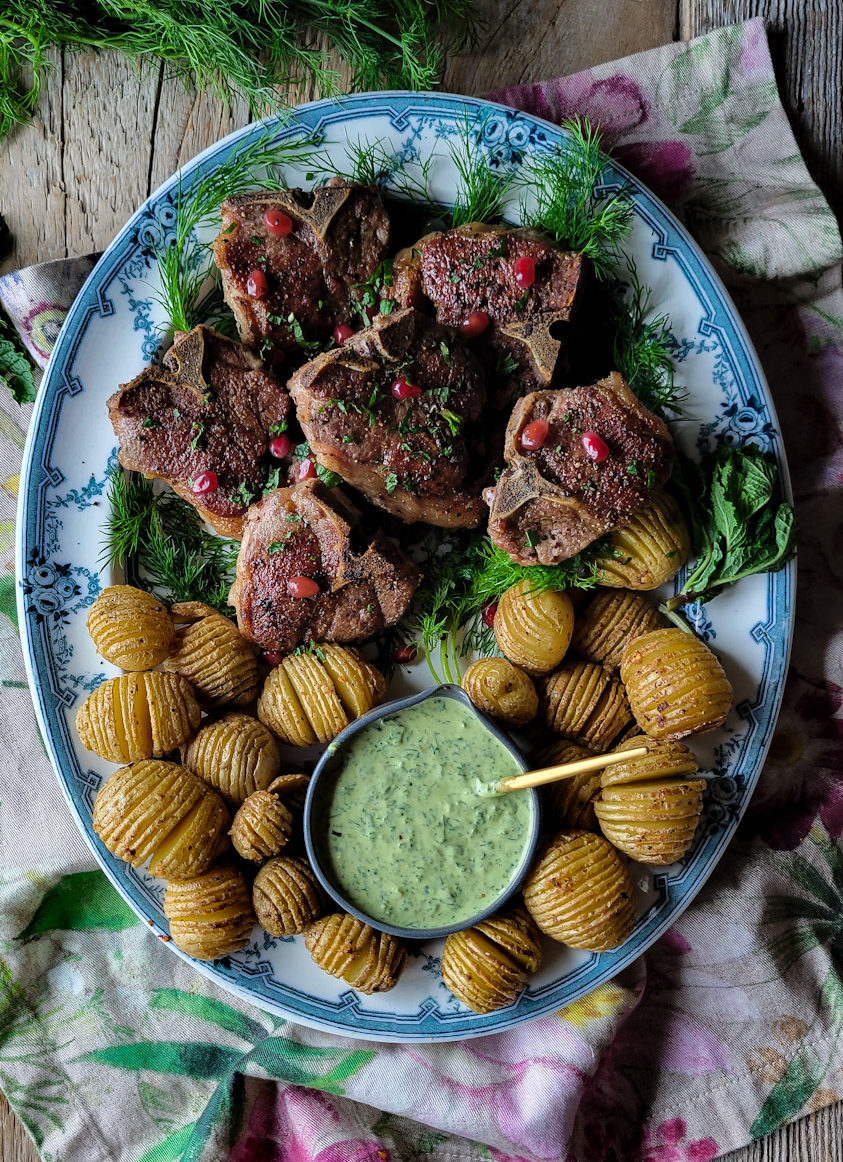 Roast potatoes with green sauce and tahini