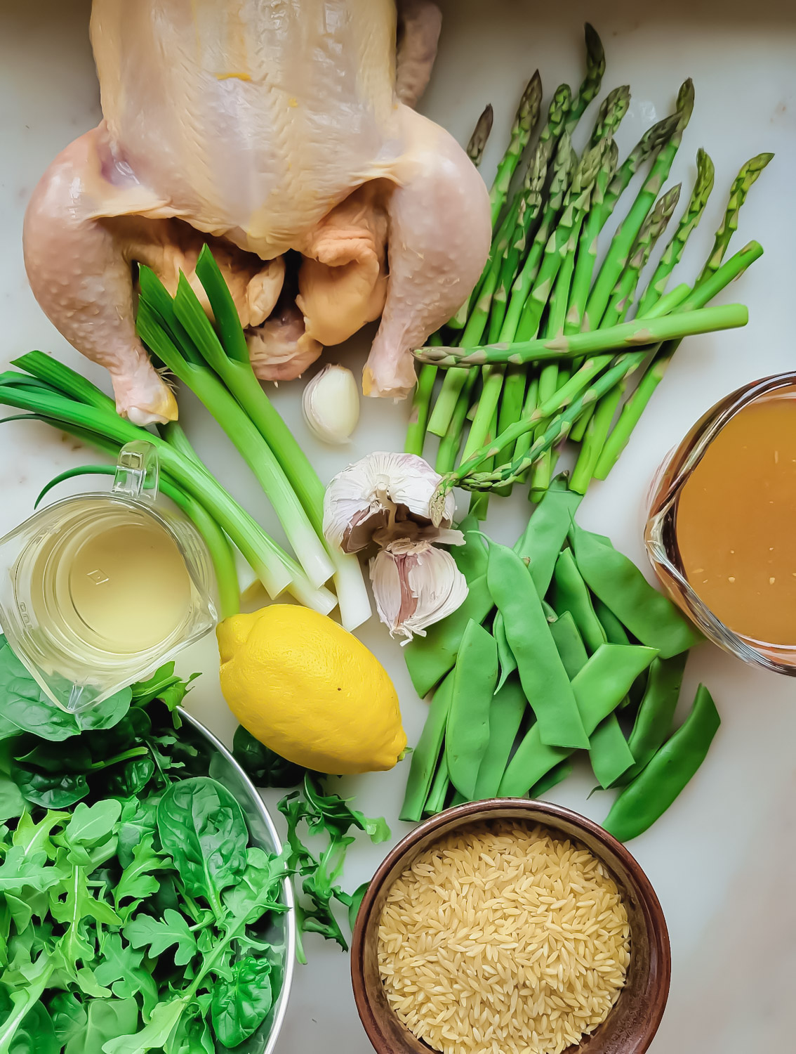 Ingredients needed to make One Pot Spring Chicken and Orzo.
