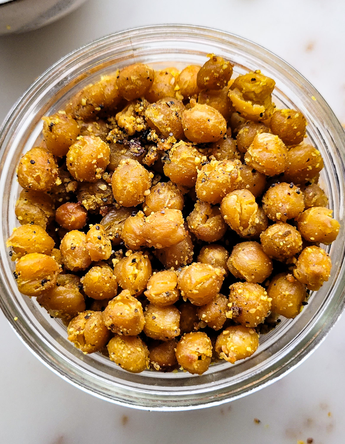 A jar filled with Dukkah Roasted Chickpeas