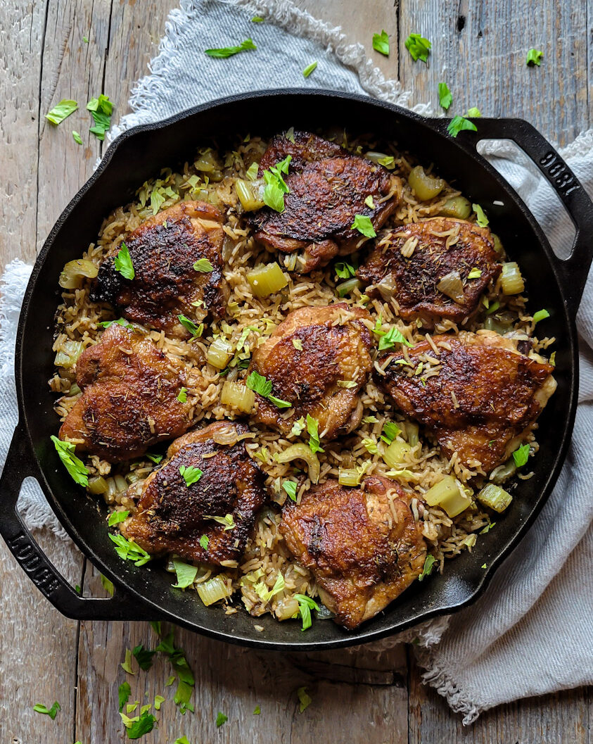 A skillet filled with Mama's Chicken and Rice