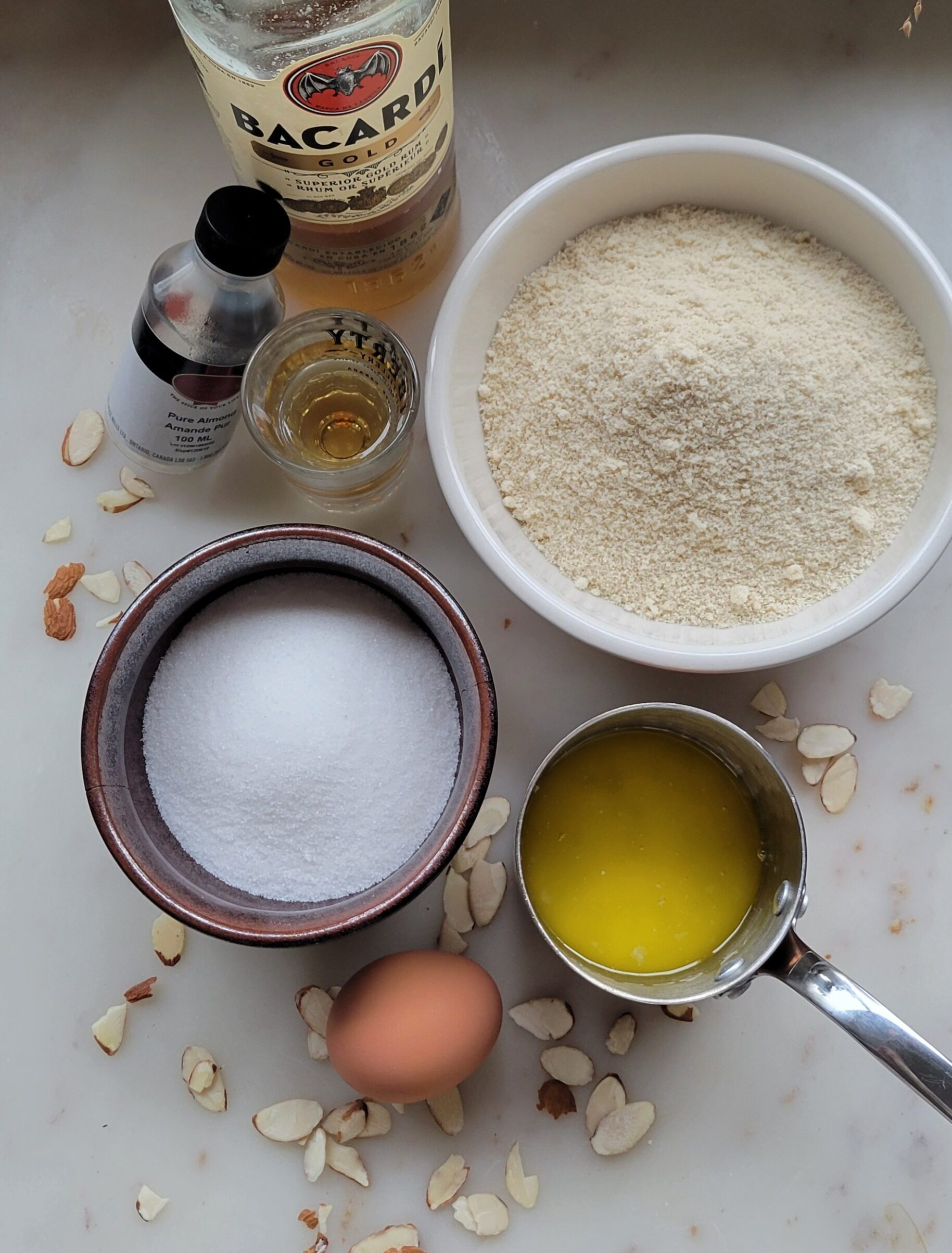 The ingredients needed to make the almond Frangipane for Almond Croissant Cookies on the counter.