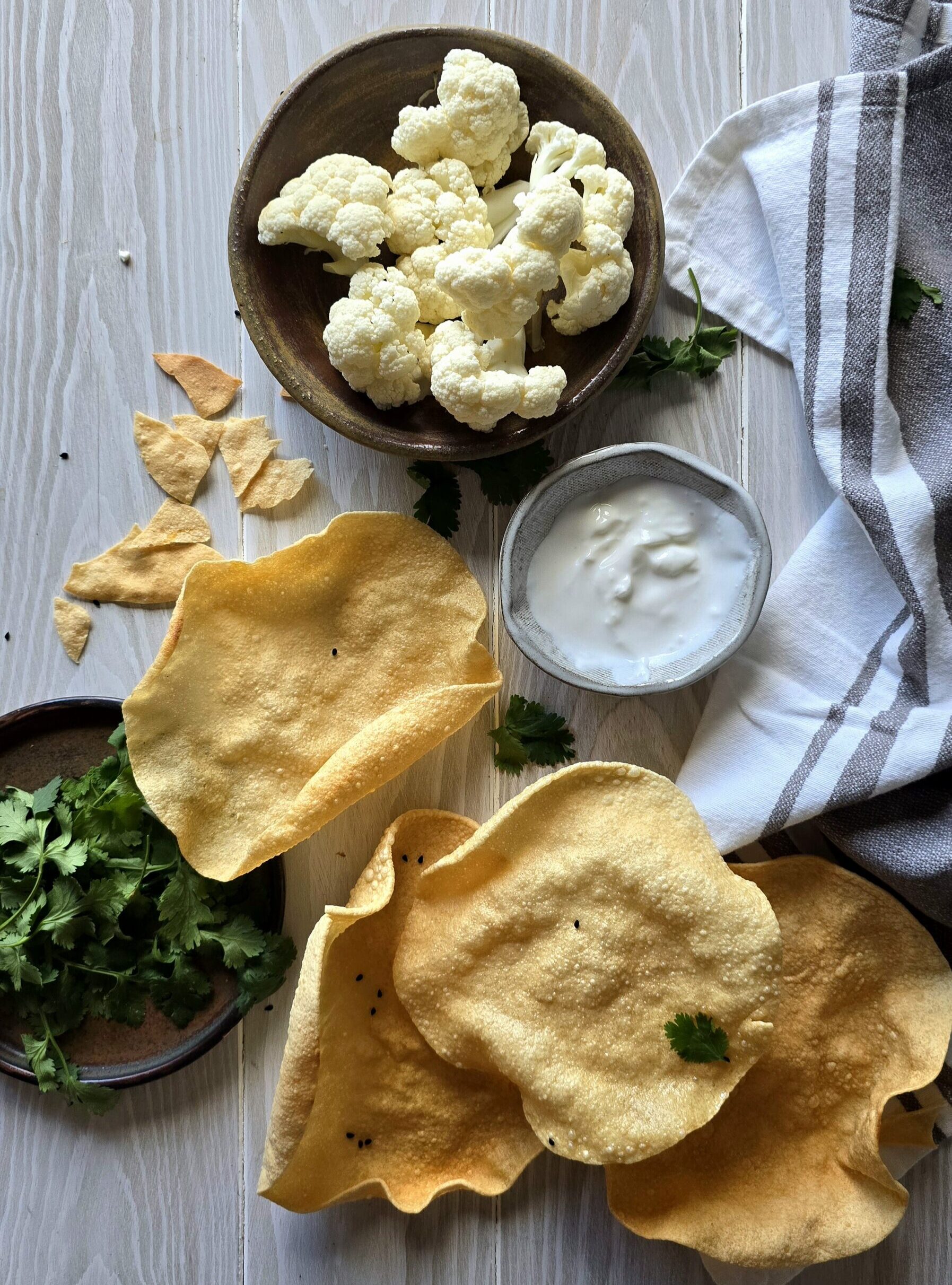 Crispy Paddamums on the table are ready to be dunked into a bowl of Curry Cauliflower Soup.